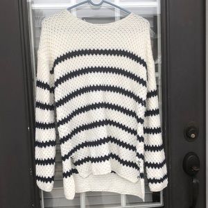 A white and navy striped sweater